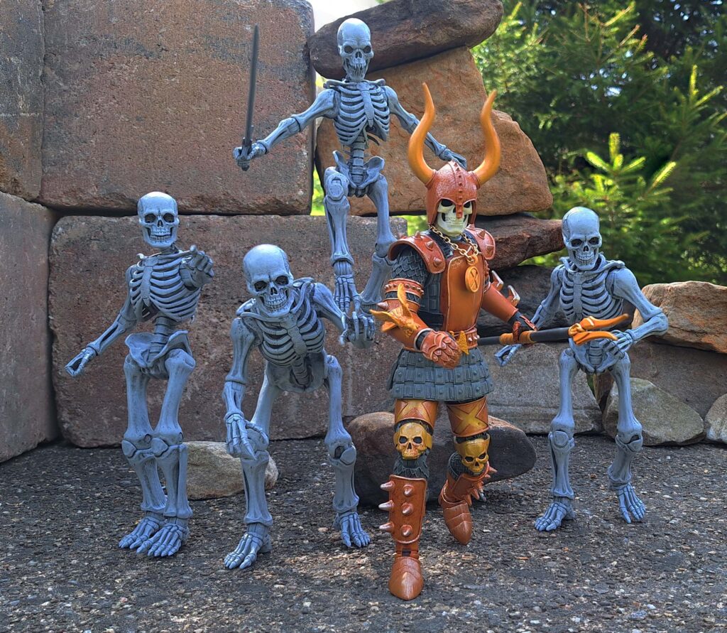 Black Falcon leading skeleton army toy figures in outdoor setting