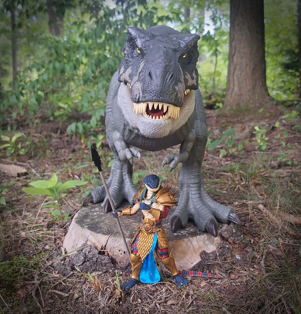 80s pulp-fantasy comic style cover art showing Varnakk, a serpent warrior, beside his roaring T-Rex companion. Featured image for the story The Oath of Fang and Spear: Prelude to The Hunt That Shook the Forest.