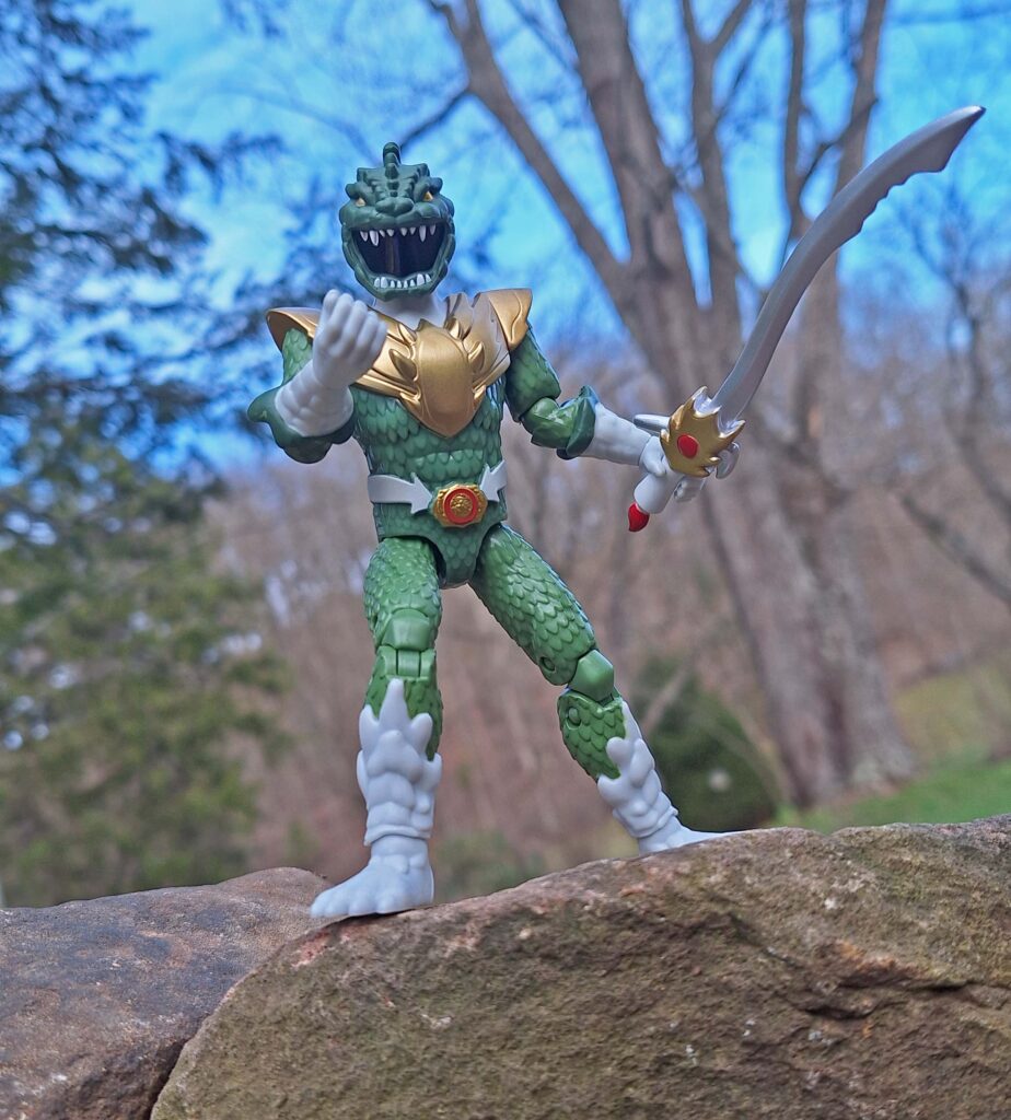 On Stone Ridge, the Green Godzilla Ranger doesn’t advance—he challenges. The ground itself answers.