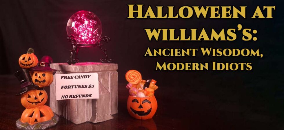 A glowing crystal ball sits on a ceremonial pedestal surrounded by Halloween decorations and a bowl of candy.